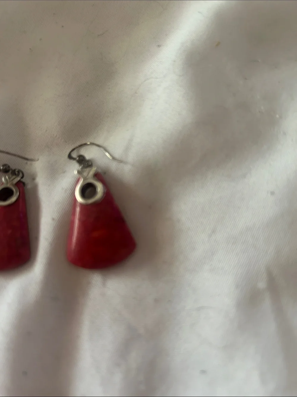 Nice silver and coral earrings. These match necklace with similar shape